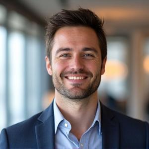 Marcus Thorne, Customer Support, with a friendly expression in a modern, airy office setting.