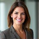 Smiling woman, Jennifer, a marketing executive, in a professional setting